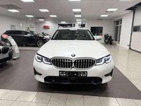 Gebraucht BMW 330e Luxury Line 184 PS (135 kW) 2022 Mineralweiss metallic Kombi