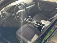 Gebraucht BMW 116 122 PS (89 kW) 2007 Schwarz Kleinwagen
