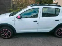 Gebraucht Dacia Sandero Expression 90 PS (66 kW) 2013 Weiß Kleinwagen