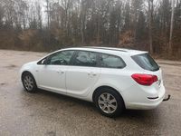 Gebraucht Opel Astra 125 PS (91 kW) 2011 Weiß Kombi
