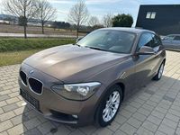Gebraucht BMW 114 Advantage 102 PS (75 kW) 2014 Braun Kleinwagen