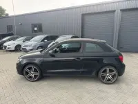 Używany Audi A1 Attraction 122 KM (89 kW) 2011 Czarny Hatchback