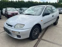 Używany Mazda 323C 88 KM (64 kW) 1997 Srebrny Sedan/Limuzyna