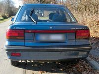 Second-hand Mitsubishi Lancer 97 CP (71 kW) 1990 Albastru Berlinǎ