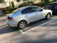 Używany Mazda 3 101 KM (74 kW) 2004 Srebrny Sedan/Limuzyna