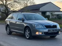 Używany Skoda Octavia 105 KM (77 kW) 2012 Szary Kombi