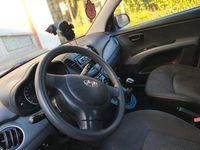 Gebraucht Hyundai i10 67 PS (49 kW) 2012 Rot Kleinwagen