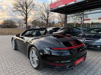 Gebraucht Porsche 911 Carrera 4 Cabriolet 385 PS (283 kW) 2023 Tiefschwarz Cabrio