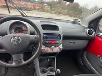 Gebraucht Toyota Aygo 68 PS (50 kW) 2010 Rot Kleinwagen