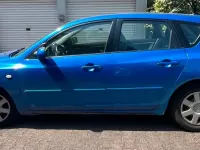Używany Mazda 3 84 KM (61 kW) 2004 Niebieski Sedan/Limuzyna