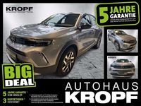 Gebraucht Opel Mokka-e Elegance 100 kW (136 PS) 2022 Kontrast grau/quarz silber SUV