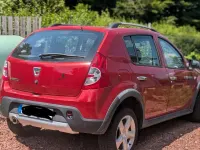 Gebraucht Dacia Sandero Stepway 84 PS (61 kW) 2012 Rot Kleinwagen