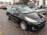 Gebraucht Peugeot 207 73 PS (53 kW) 2011 Schwarz Kleinwagen
