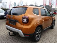 Używany Dacia Duster 116 KM (85 kW) 2021 Pomarańczowy SUV