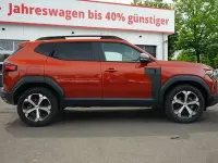 Neu Dacia Duster Journey 155 PS (114 kW) 2025 Terracottabraunmet. SUV