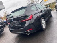 Gebraucht BMW 320e Shadowline 204 PS (150 kW) 2022 Saphirschwarz metallic (475) Kombi