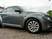 Gebraucht VW Beetle Design 105 PS (77 kW) 2013 Grau Kleinwagen