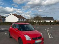Second-hand Suzuki Swift 92 CP (67 kW) 2009 Roșu Hatchback