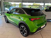 Gebraucht Opel Mokka-e Ultimate 100 kW (136 PS) 2021 Matcha green/ikone gruen SUV