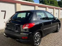 Gebraucht Peugeot 206+ 73 PS (53 kW) 2011 Schwarz Kleinwagen
