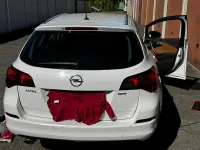 Second-hand Opel Astra 165 CP (121 kW) 2011 Alb Break
