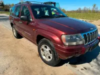 Gebraucht Jeep Grand Cherokee Laredo 190 PS (139 kW) 2000 Rot SUV
