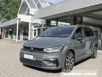 Gebraucht VW Touran Highline 150 PS (110 kW) 2025 Delfingrau (grau) Van / Kleinbus