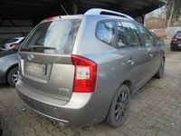 Używany Kia Carens 128 KM (94 kW) 2010 Szary Minivan