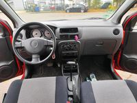 Gebraucht Daihatsu Cuore 58 PS (42 kW) 2003 Rot Kleinwagen
