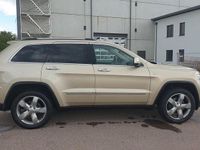 Gebraucht Jeep Grand Cherokee Overland 241 PS (177 kW) 2011 Gold SUV
