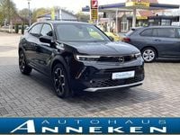 Gebraucht Opel Mokka-e Ultimate 100 kW (136 PS) 2023 Diamant schwarz/karbon schwarz SUV