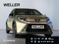 Gebraucht Toyota Aygo 72 PS (52 kW) 2022 Ginger beige / night sky black Kleinwagen