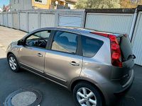 Second-hand Nissan Note 110 CP (80 kW) 2007 Auriu Hatchback