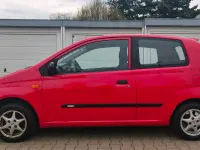 Gebraucht Daihatsu Cuore 58 PS (42 kW) 2005 Rot Kleinwagen