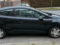 Gebraucht Ford Fiesta Trend 60 PS (44 kW) 2011 Schwarz Kleinwagen
