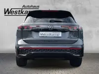 Gebraucht VW Tiguan Style 265 PS (194 kW) 2024 Delfingrau metallic SUV