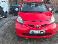 Gebraucht Toyota Aygo 69 PS (50 kW) 2007 Rot Kleinwagen