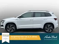 Gebraucht Skoda Karoq SportLine 190 PS (139 kW) 2023 Moonweiß perleffekt SUV