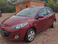 Używany Mazda 2 75 KM (55 kW) 2012 Czerwony Hatchback