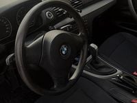Second-hand BMW 116 116 CP (85 kW) 2009 Negru Hatchback