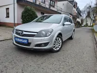 Gebraucht Opel Astra Selection 116 PS (85 kW) 2009 Argon silber/ice silver (m2) Kombi