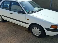 Gebraucht Mazda 323 84 PS (61 kW) 1990 Weiß Limousine