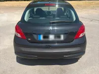 Gebraucht Peugeot 207 73 PS (53 kW) 2011 Schwarz Kleinwagen