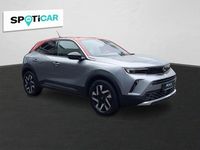 Gebraucht Opel Mokka-e Elegance 100 kW (136 PS) 2022 Kontrast grau/quarz silber SUV