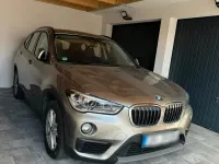 Używany BMW X1 150 KM (110 kW) 2016 Brązowy SUV