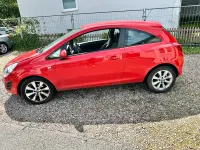 Gebraucht Opel Corsa 70 PS (51 kW) 2013 Rot Kleinwagen