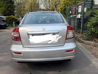 Usado Suzuki SX4 105 HP (77 kW) 2010 Prateado Sedan