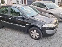 Używany Renault Mégane 110 KM (80 kW) 2004 Czarny Sedan/Limuzyna