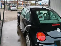Gebraucht VW New Beetle 75 PS (55 kW) 2002 Schwarz Kleinwagen