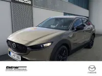 Gebraucht Mazda CX-30 Nagisa 186 PS (136 kW) 2024 Zircon sand (metallic) SUV